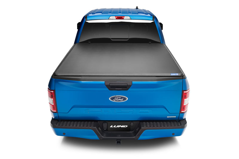 Lund 09-14 Ford F-150 Styleside (6.5ft. Bed) Hard Fold Tonneau Cover - Black